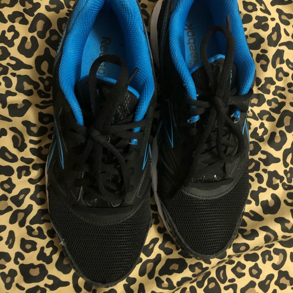 Black with blue trim Reebok!